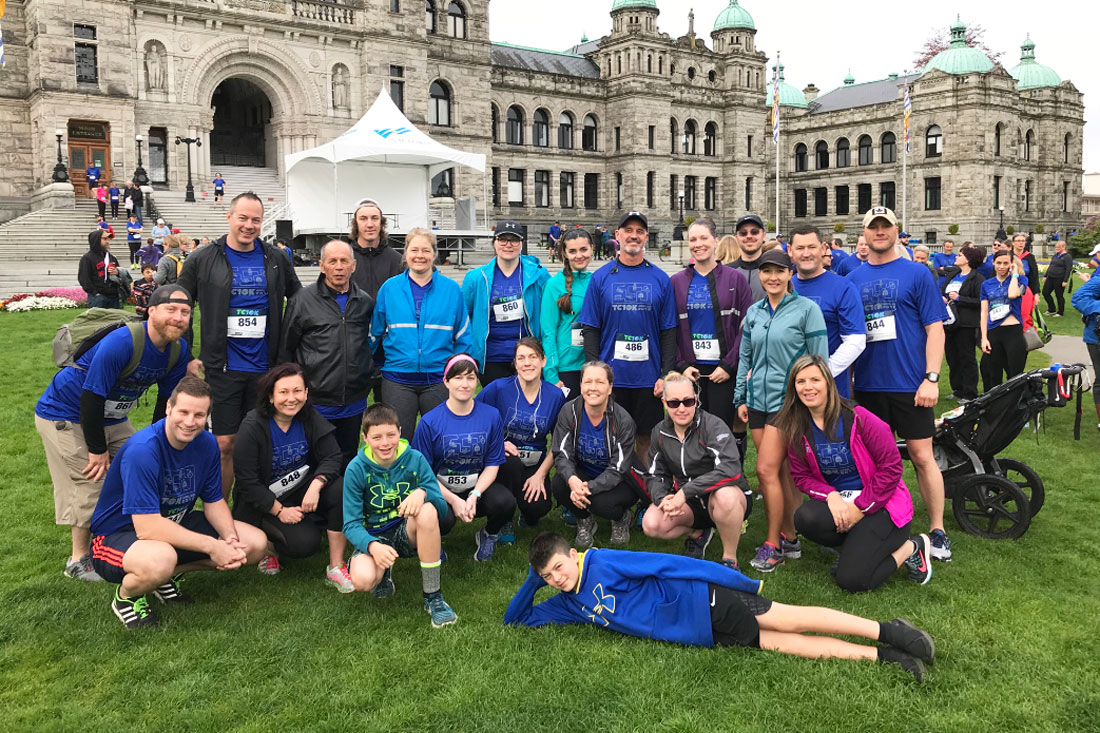 Times-Colonist-PS1100 Image of people in a running team